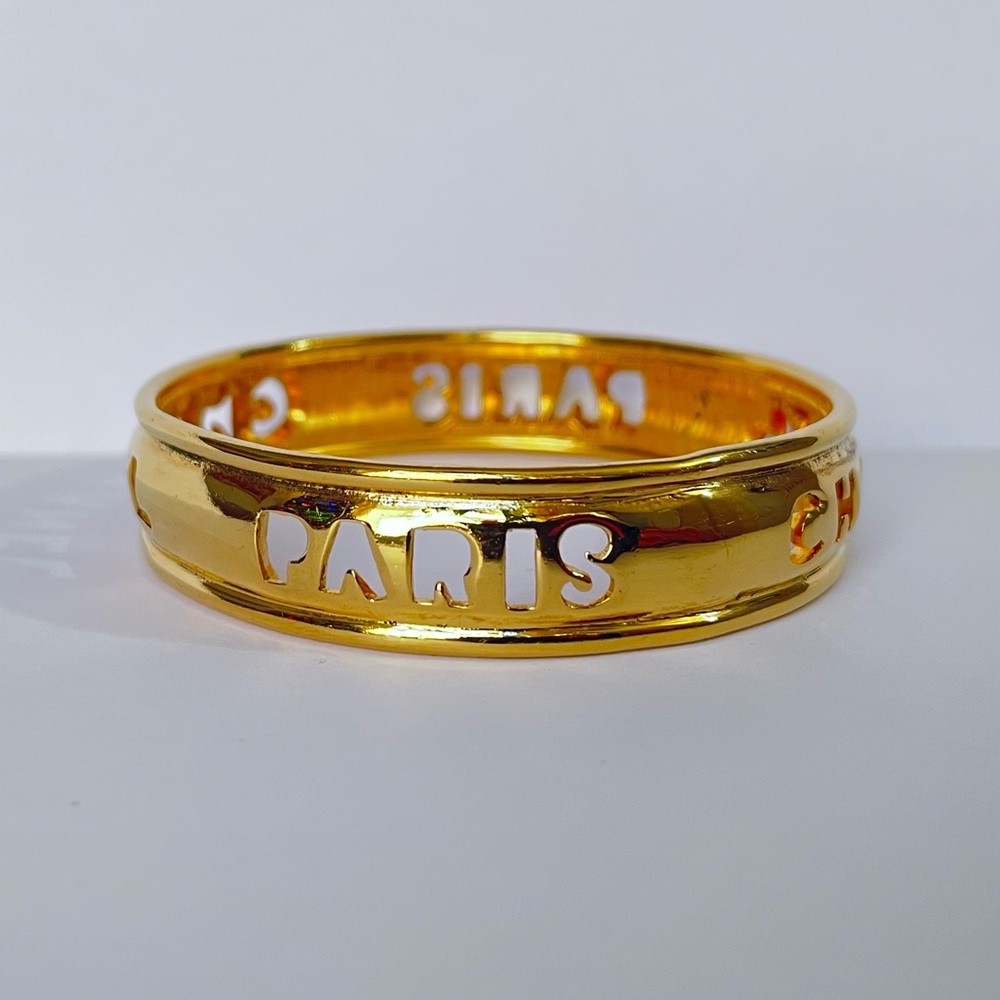 Chanel Vintage 24K Gold plated Bangle Logo cut out Bracelet. 80’s. - Picture 2 of 7